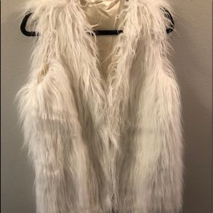 White faux fur vest